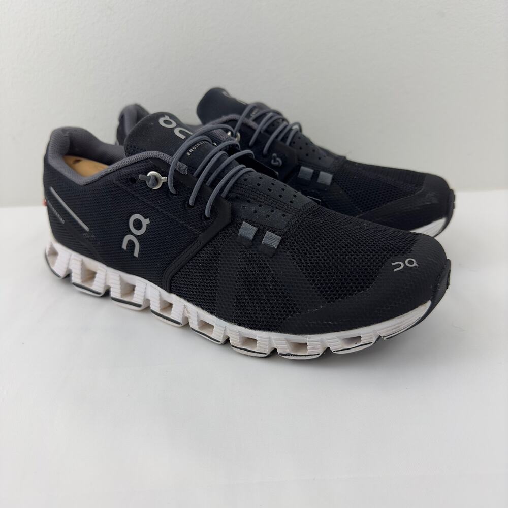 On Cloud black running shoes